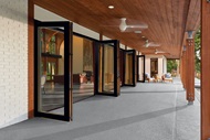 Large Patio With Multiple Signature Ultimate Bi-Fold Doors to Living Room 