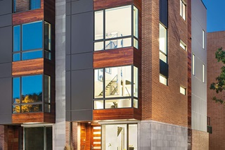 Exterior View Of Building With Signature Ultimate Corner Windows