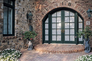 Beautiful Stone-Faced Entrance Of House With Signature Ultimate Swinging Arch Top French Door 