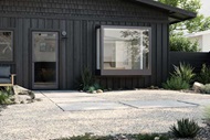 Exteior image of modern home with modern swinging door