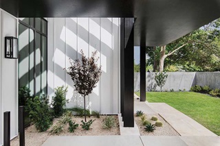 Marvin Modern Direct Glaze windows on the front of Stay Bungalow in Austin, Texas.