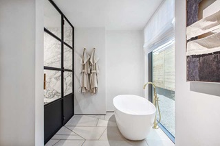 Marvin Modern Direct Glaze window in a modern bathroom at Stay Bungalow in Austin, Texas.