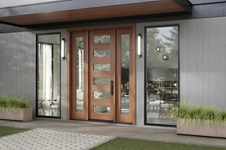 Exterior of home with TruStile modern entry door with horizontal glass inserts