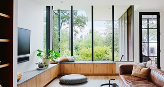 Living room with Marvin windows and doors